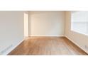 Bright living room featuring hardwood floors and neutral walls at 2249 Clanton Ter, Decatur, GA 30034