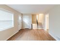 Hardwood floors and neutral color palette in spacious living room at 2249 Clanton Ter, Decatur, GA 30034
