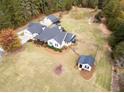 House with large backyard, detached garage, and garden at 5601 Atlanta Hwy, Rutledge, GA 30663