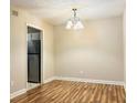 Bright dining room with hardwood floors and a chandelier at 1011 Dunbar Dr, Atlanta, GA 30338