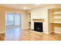 Living room with hardwood floors and a view to the dining area at 1011 Dunbar Dr, Atlanta, GA 30338