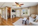 Cozy living room with hardwood floors and built-in shelving at 3001 Hilltop Dr, Atlanta, GA 30341