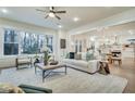 Bright and airy living room featuring a cozy seating area and an open floor plan at 754 Moon Road, Lawrenceville, GA 30046