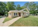 Newly renovated brick home with a covered porch and driveway at 1546 Richland Sw Rd, Atlanta, GA 30311