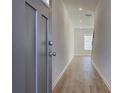 Bright entry hall with gray door and wood-look floors at 329 Shine Dr, Stockbridge, GA 30281