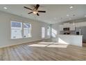 Spacious living room featuring hardwood floors and lots of natural light at 329 Shine Dr, Stockbridge, GA 30281
