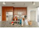 Modern kitchen with granite countertops and stainless steel appliances at 1080 Peachtree Ne St # 2710, Atlanta, GA 30309