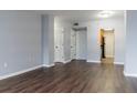 Living room featuring hardwood floors and multiple entry points at 1280 W Peachtree Nw St # 2813, Atlanta, GA 30309