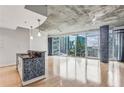 Spacious living area with hardwood floors and city views at 950 W Peachtree Nw St # 812, Atlanta, GA 30309