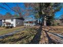 Newly renovated home with a charming front yard and walkway at 1333 Womack Ave, Atlanta, GA 30344