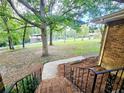 View of the side yard and street from the steps at 1825 Francis Dr, Conyers, GA 30094