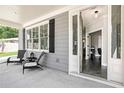 Front door open, view into the home's entryway and living area at 510 Oak Dr, Hapeville, GA 30354