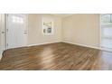 Living room featuring wood-look floors and neutral walls at 3218 Ward Sw Dr, Atlanta, GA 30354