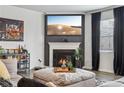 Cozy living room with fireplace, media center, and ample seating, perfect for relaxing at 251 Ivy Chase Loop, Dallas, GA 30157