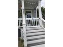 White front steps leading to charming front door at 857 Proctor Nw St, Atlanta, GA 30314