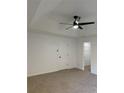 Bright bedroom with ceiling fan and walk-in closet at 235 Prestwyck Oak, Lawrenceville, GA 30043