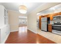 Open-concept dining room flows into the kitchen, creating a seamless living space at 2355 Henderson Mill Ne Rd # 6, Atlanta, GA 30345