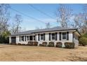 Charming white brick ranch home with a well manicured lawn at 2488 Elizabeth Ann Ne Ln, Atlanta, GA 30324