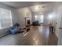 Living room features a fireplace and hardwood floors at 131 Magazine St, Dallas, GA 30157