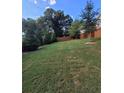 Large backyard with a wooden privacy fence at 151 Roy St # A & B, Canton, GA 30114