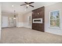 Living room featuring a modern fireplace and carpet at 960 N Grand Nw Ave, Atlanta, GA 30318