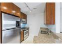 Modern kitchen with stainless steel appliances at 3338 Peachtree Ne Rd # 1104, Atlanta, GA 30326