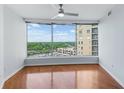 Living room featuring hardwood floors and large windows at 3338 Peachtree Ne Rd # 1104, Atlanta, GA 30326