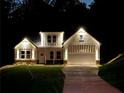 Stunning two-story home featuring excellent lighting, a two-car garage, and a well-manicured lawn at 485 N Oakland Cir, Mcdonough, GA 30253