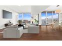 Spacious living room with hardwood floors and city views at 1820 Peachtree Nw St # 1909, Atlanta, GA 30309