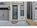 Inviting front entrance with a modern door and welcome mat at 606 Broadview Ne Ter, Atlanta, GA 30324