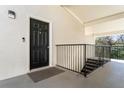 Private building entrance with keyless entry and stairs at 1150 Collier Nw Rd # J15, Atlanta, GA 30318