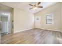 Spacious living room with vinyl flooring and ceiling fan at 2329 Abner Nw Pl, Atlanta, GA 30318