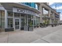 Modern building entrance at 1010 Midtown, with glass doors, and outdoor landscaping at 1080 Peachtree Ne St # 804, Atlanta, GA 30309