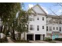 Elegant two-story home exterior with a double garage and well-maintained landscaping, exuding curb appeal at 951 Glenwood Se Ave # 1201, Atlanta, GA 30316