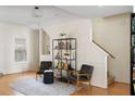 Cozy living room with hardwood floors, neutral paint, and ample natural light at 951 Glenwood Se Ave # 1201, Atlanta, GA 30316