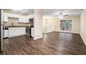 Modern kitchen with stainless steel appliances and white cabinets at 2876 Battle Forrest Dr, Decatur, GA 30034