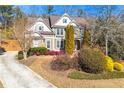 Two-story house with stone accents and landscaping at 6202 Millstone Trl, Douglasville, GA 30135