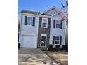 Charming two-story home with stone accents and a well-maintained front yard at 5140 Sky Ridge Way, Cumming, GA 30041