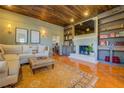 Spacious living room with a fireplace and built-in shelving at 5143 Floyd Ne St, Covington, GA 30014
