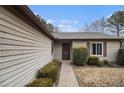 House exterior showcasing walkway and entry door at 546 Paden Dr, Lawrenceville, GA 30044