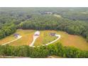 Aerial view showing a house, barn, and expansive property at 350 Taylor Path, Dallas, GA 30157