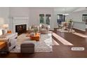 Staged living room featuring neutral colors and cozy furniture at 2268 Turtle Club Ne Dr, Marietta, GA 30066