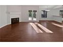 Empty living room featuring natural light and a fireplace at 2268 Turtle Club Ne Dr, Marietta, GA 30066