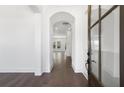 Bright entryway with hardwood floors and view to living area at 3921 Enclave Way, Tucker, GA 30084