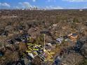 Aerial view of property showing lot size and location in relation to surrounding houses and city skyline at 959 Woodbourne Sw Dr, Atlanta, GA 30310