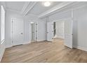 Bright bedroom with hardwood floors and access to a bathroom at 4074 Hosch Retreat Dr, Buford, GA 30519