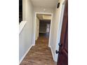 Inviting entryway with wood-look flooring and a view into the adjacent living space at 6002 Pat Mell Se Pl, Smyrna, GA 30080