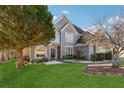 Two-story house with front yard and landscaping at 4497 Black Water Cv, Ellenwood, GA 30294