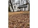 House with white siding, black accents, and a large yard at 702 Talemwood Ct, Lawrenceville, GA 30044