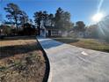 Newly renovated home with a modern exterior and driveway at 1840 Judy Se Cir, Marietta, GA 30060